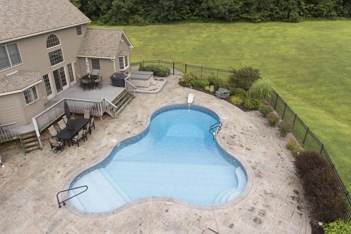 in ground pool in backyard