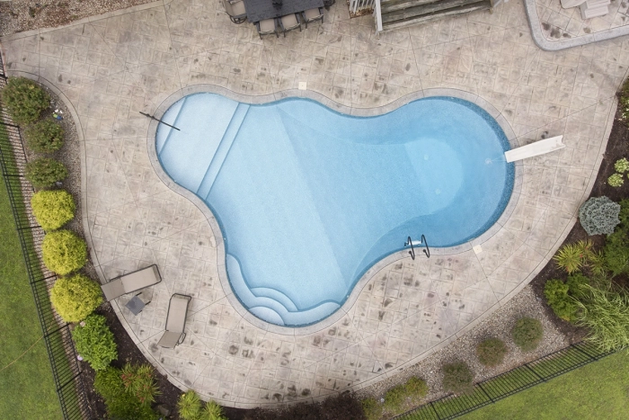 drone shot of an in ground pool